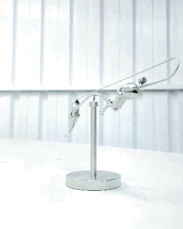 🎣Escultura del pescador en equilibrio
