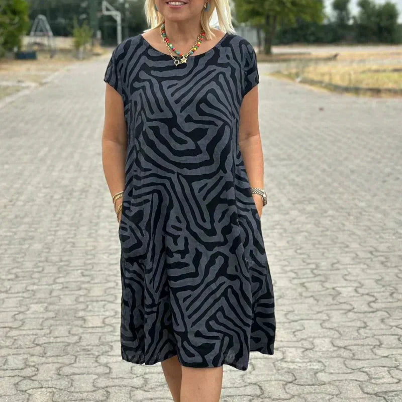 🌸 Veraniego vestido bohemio de flores con escote redondo