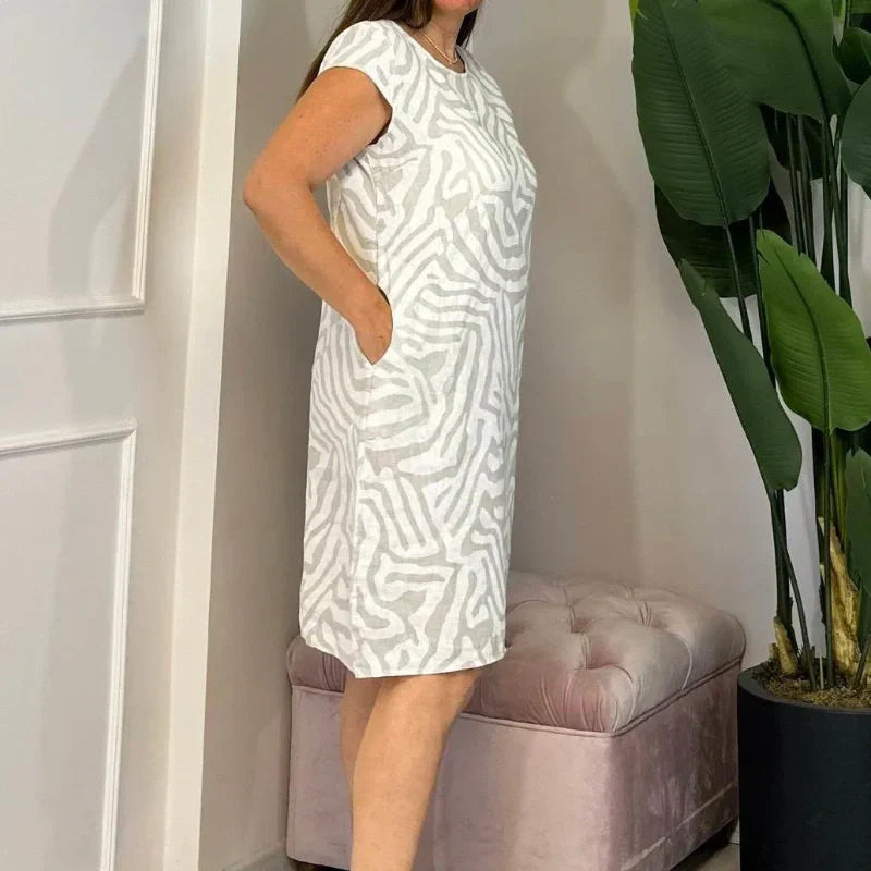 🌸 Veraniego vestido bohemio de flores con escote redondo