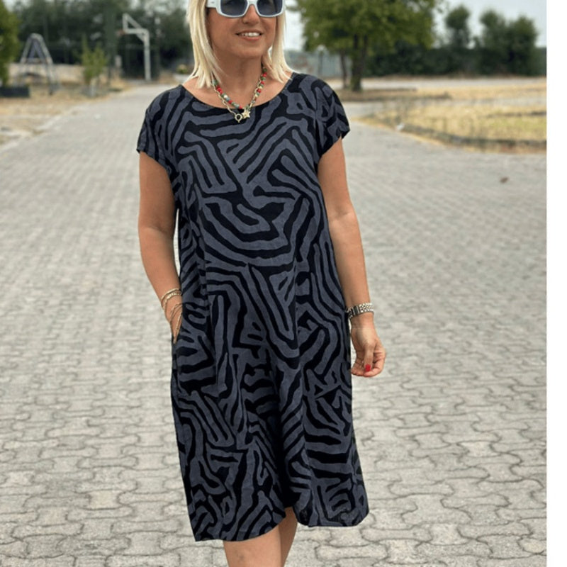 🌸 Veraniego vestido bohemio de flores con escote redondo