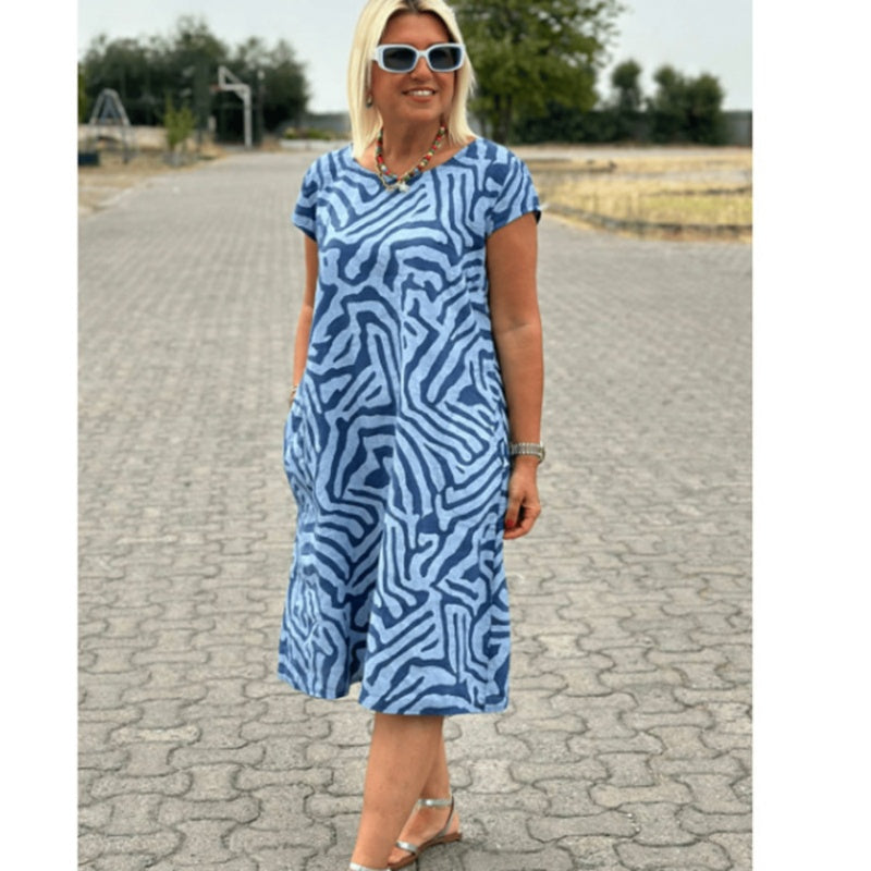 🌸 Veraniego vestido bohemio de flores con escote redondo